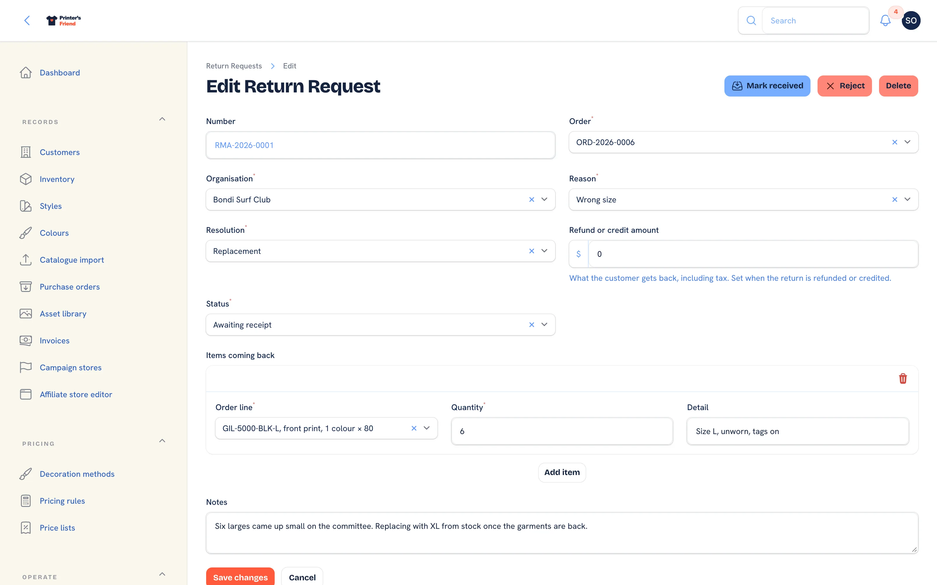 A return awaiting receipt, with its lines and the actions in the header