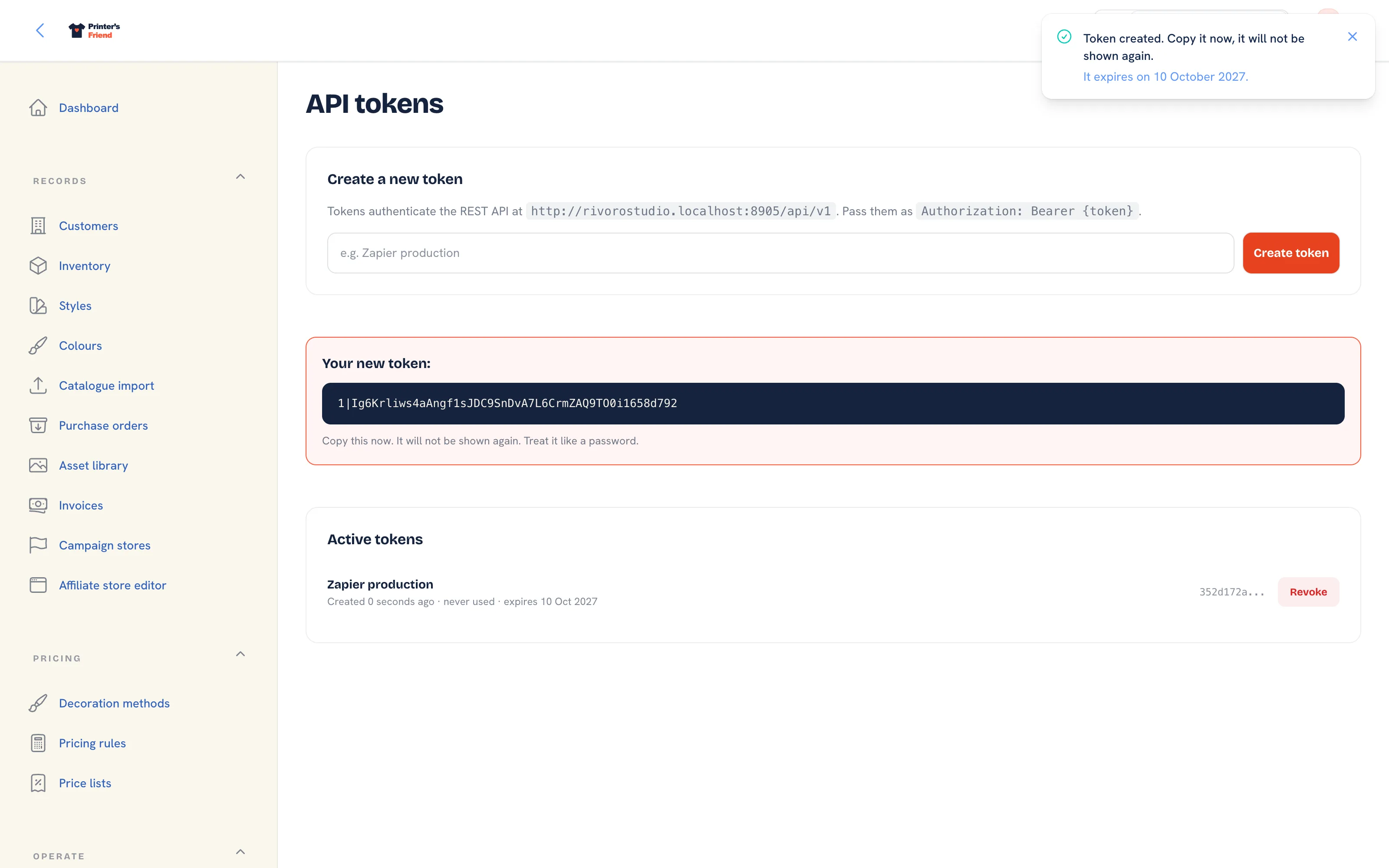 The API tokens page after Create token, with the Token created notice and the one-time Your new token box above the token list